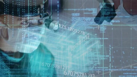 Surgeon activating headlamp initiating code fragments, rotating 3D cube Stock Footage 317185196
