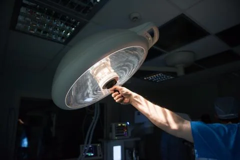 Surgeon adjusting operating light in a modern Middle Eastern eye hospital Stock Photos