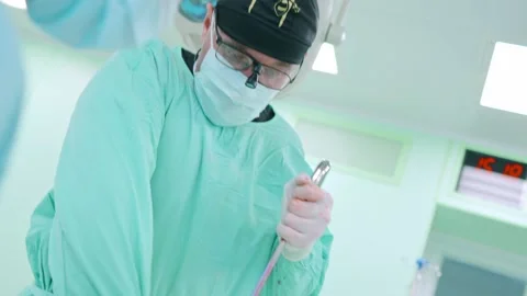Surgeon and an assistant perform an endoscopic operation Video stock 173161135