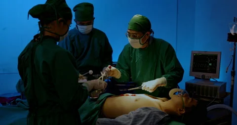 Surgeon and Group doctor assistant are performing abdominal surgery on patients  Stock Footage