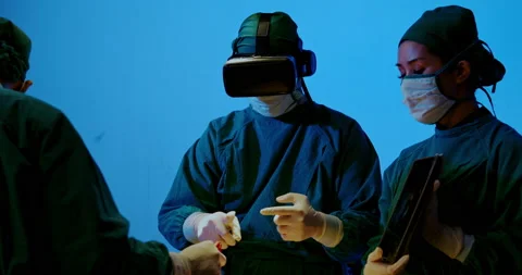 Surgeon and Group doctor assistant are performing abdominal surgery on patients  Видео 198632453