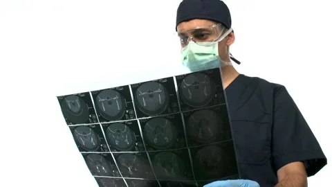 Surgeon checking mri scan Stock Footage 210532076
