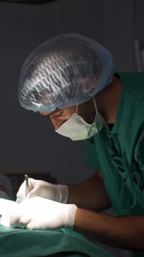 A surgeon diagnosing and identifying heart problems in an elderly woman Stock Footage 274872087