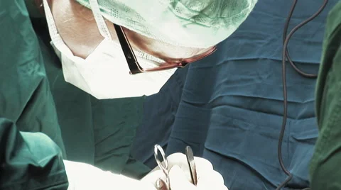 Surgeon doing a vein surgery Stock Footage 67284532