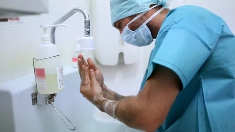 Surgeon hand washing before operation Stock Footage 95637808