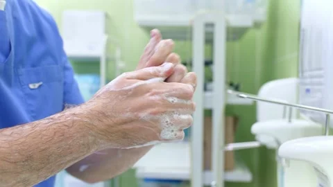 Surgeon handles hands before surgery Stock Footage 150888499