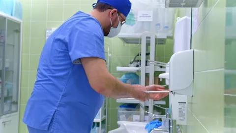 Surgeon handles hands before surgery Stock Footage 150890998