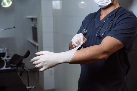 Surgeon holding medical instruments in hands. Concept of a healthy Stock Photos