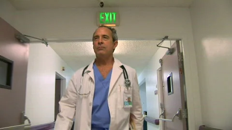 Surgeon in hospital corridor Stock Footage