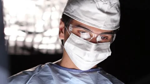Surgeon in the operating room Stock Footage 7752559