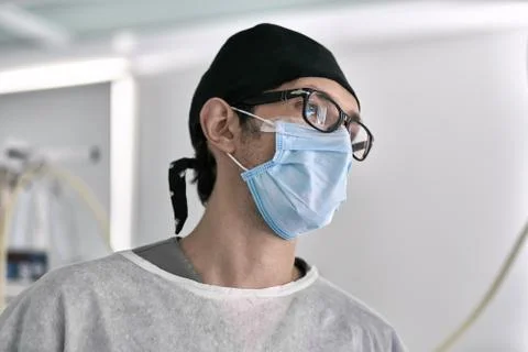 Surgeon in operating room Stock Photos