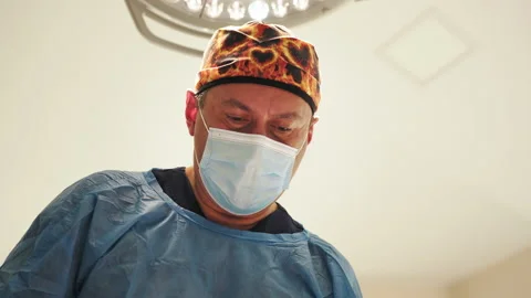 Surgeon performing complex surgery in the intensive care unit. Veterinarian Stock Footage 173818249