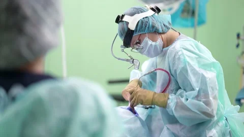 Surgeon is performing operation of correcting nasal septum, endonasal removal of Stock-Footage 167005790