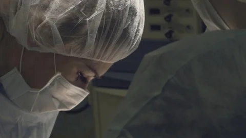 The surgeon is performing an operation on the eyes. Correction of eyes. Видео 89216950