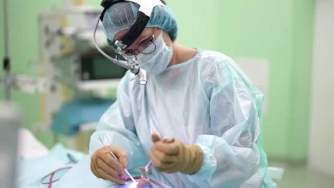 The surgeon performs an endoscopic operation. The doctor bent over the patient Stock Footage 172465610