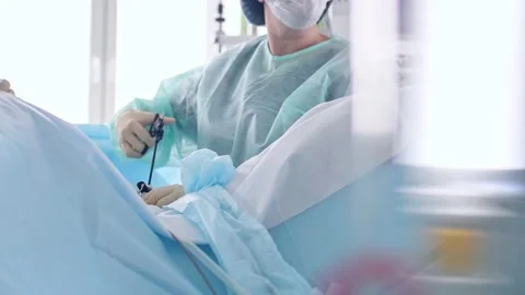 The surgeon performs a surgical operation Stock Footage 150884684