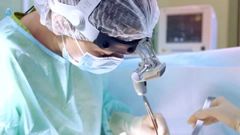 The surgeon performs a surgical operation Stock Footage 150885116