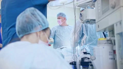 The surgeon performs a surgical operation Stock Footage 150885579