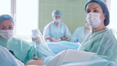 The surgeon performs a surgical operation Stock Footage 150888866