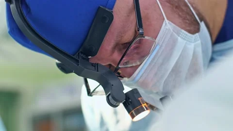 The surgeon performs a surgical operation Stock Footage 150888961