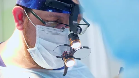 The surgeon performs a surgical operation Stock Footage 150890714