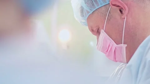The surgeon performs a surgical operation Stock Footage 150892056
