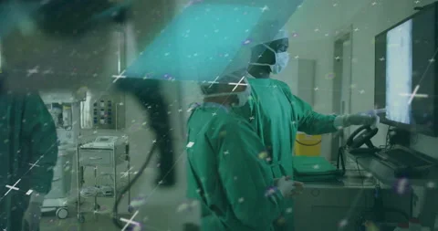 Surgeon pointing at scan as tech zooming images with AI overlay guiding blurred Stockbeeldmateriaal 315528167