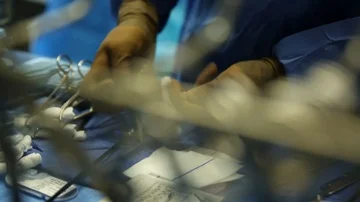 Surgeon preparing his equipment Stock Footage 85933115