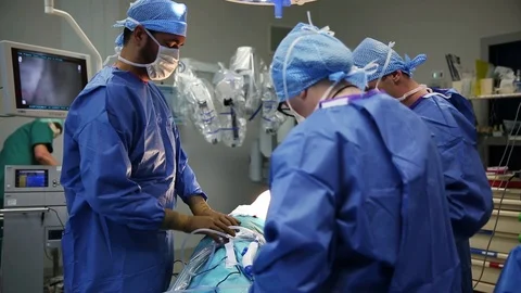 Surgeon preparing medical camera Stock Footage 85892206