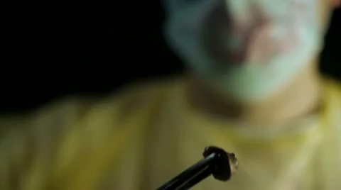 Surgeon Removes Bullet Closeup Video stock 12850331