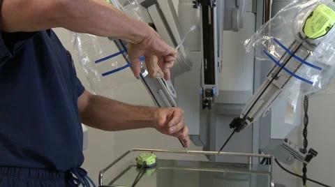 Surgeon shows DaVinci Insert Stock Footage 40062423