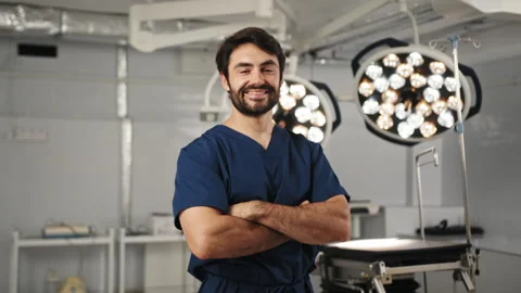 Surgeon Standing Confidently in OR Stock Footage 315974248