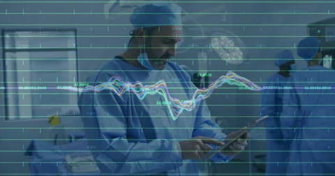 Surgeon tapping tablet slider to initiate waveform smoothing in medical OR Stock Footage 309894245