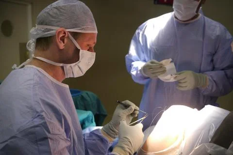 Surgeon in theater Фото