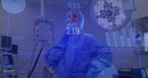 Surgeon touching mask and removing it in operating room to reveal smile while Stock Footage 314848851