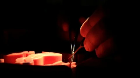 The surgeon trains to suture Stock Footage 89567519