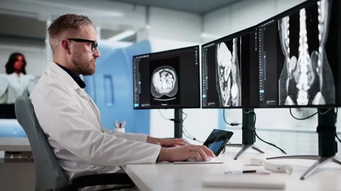 Surgeon Using Desktop Computer Stock Footage 321155395