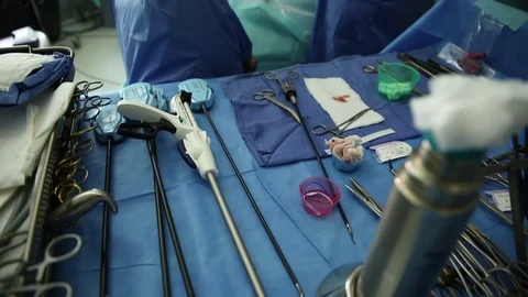 Surgeon using equipment Stock Footage 85932541