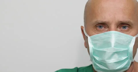  Surgeon Wearing Protective Mask Hospital Surgical Concept Pan Right Shooting Stock Footage 59376260