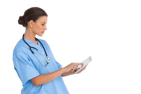 Surgeon working on digital tablet Stock Photos