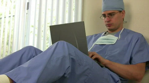 Surgeon Working on Laptop Stock-Footage 400741
