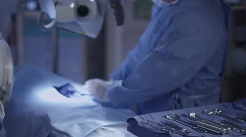 Surgeon working on patient Stock Footage 59743375