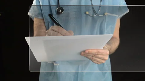 Surgeon working with screen Stock-Footage 210228621