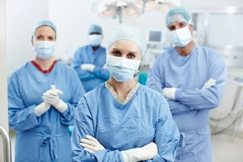Surgeons with a commitment to excellent care. Portrait of a group of surgeons Stockfoto's