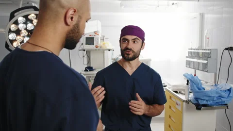 Surgeons Discussing Operation Stock Footage 315986444