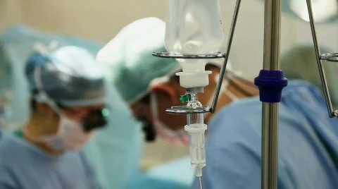 Surgeons with drip Stock Footage