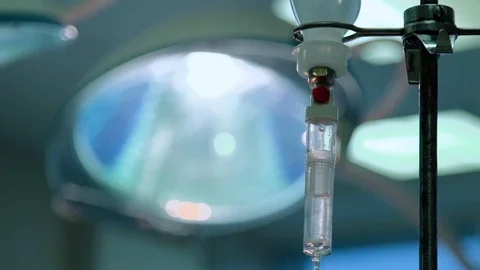 The Surgeon's hand switches the Light in the Operating Stock Footage 70875126