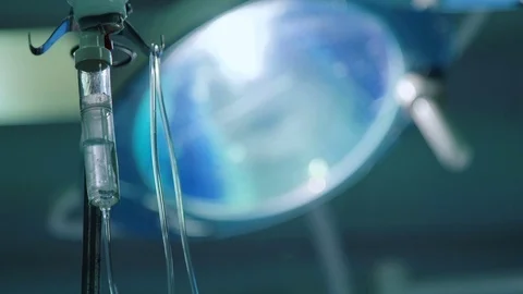 The Surgeon's hand switches the Light in the Operating Stock Footage 70875556