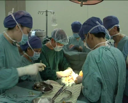Surgeons operating Stock Footage 343927