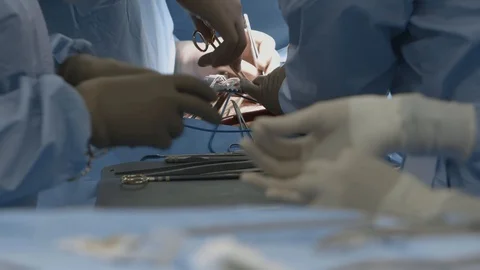 Surgeons operating process. Close up: hands in white gloves with surgery tools Stock Footage 102221450